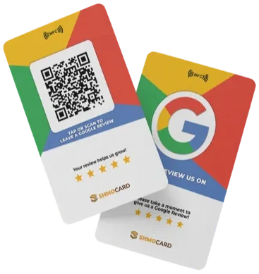 The ShmoCard review tap card, front and back, lying on the shop counter by the register